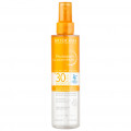 Photoderm Eau solaire BRONZ - Erfrischendes Sonnenschutzspray, das die hauteigene Bräune aktiviert. 